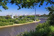View of the river Tura, pedestrian bridge and church in Tyumen View of the river Tura, pedestrian bridge and church in Tyumen