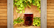 beer with wheat and hop with wooden borders beer with wheat and hop with wooden borders