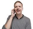 Happy young man speaking on telephone. Isolated on white.