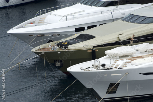 Photo: Three luxury yachts in Monte Carlo Three luxury yachts in Monte Carlo