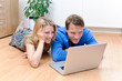 Young Couple looking at a computer