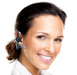 Technology - Happy young female with a bluetooth handsfree