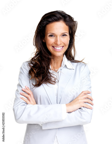 Foto: Happy young business woman standing with folded hand Happy young business woman standing with folded hand