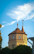 old tower with cloudy sky