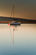 Sail boat in dawn light