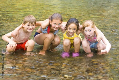 Photo: Children Playing In Water Children Playing In Water
