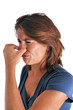 Femme qui se bouche le nez à cause des odeurs