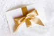 letter with golden ribbon