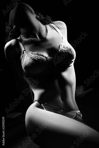 Photo: Beautiful woman's body in lingerie. Beautiful woman's body in lingerie.