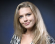 Portrait of a young beautiful woman looking at camera