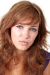 Beautiful girl crying isolated over white