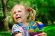 Pretty girl holding new toys for sandbox outdoor Pretty girl holding new toys for sandbox outdoor