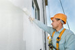 builder facade painter at work builder facade painter at work