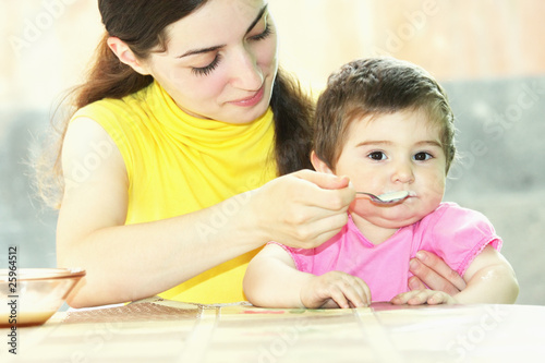 Photo: Mother feeding baby Mother feeding baby