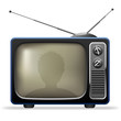 Retro TV set with viewer reflection.