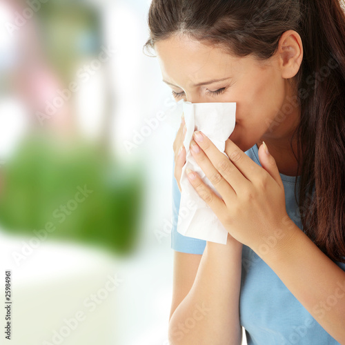 Foto: Teen woman with allergy or cold Teen woman with allergy or cold