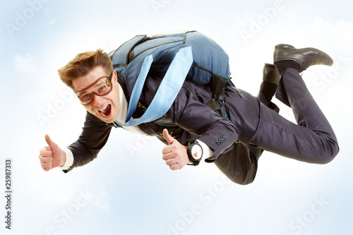 Photo: Man flying Man flying