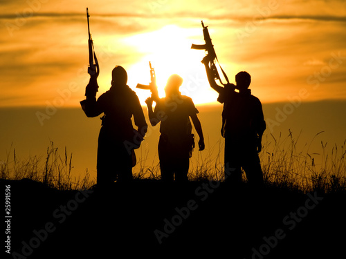 Photo: soldiers against a sunset soldiers against a sunset