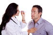 Photo: Female doctor looking into eyes Female doctor looking into eyes