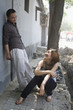 Chinese couple standing on sidewalk