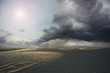 Desert with storm clouds