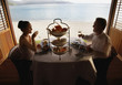 Couple eating next to beach