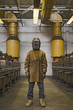 Japanese welder posing in protective gear
