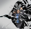 Hispanic businesswoman breaking through glass barrier