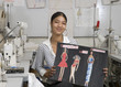 African American design student showcasing designs