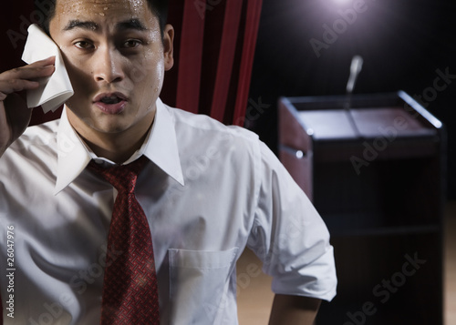 Photo: Asian man sweating backstage Asian man sweating backstage