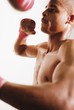 Boxer hitting speed bag