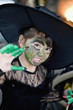 Mixed race girl in witch costume