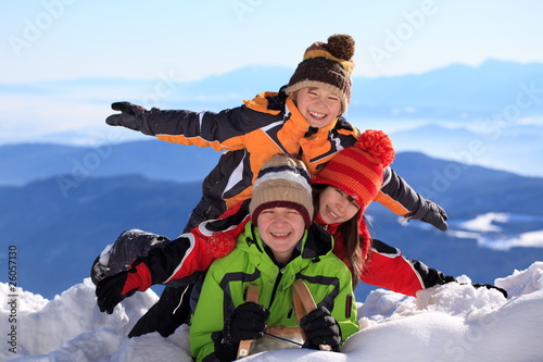 Photo: Children on snowy mountain Children on snowy mountain