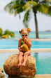 portrait of cute toddler girl with coconut portrait of cute toddler girl with coconut