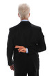 Businessman With Fingers Crossed