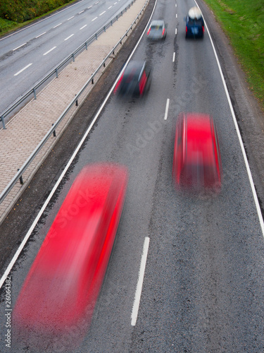 Photo: Traffic with motion blur (long exposure shot) on freeway Traffic with motion blur (long exposure shot) on freeway