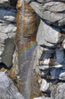 rock canyon with rainbow