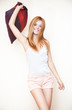 Young smiling woman with pillow