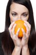 Produce - fruit  woman with orange