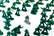 Grey Soldier Among Green Soldiers