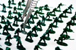 Grey Soldier Being Picked Up by Forcep