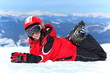 Happy girl in ski helmet
