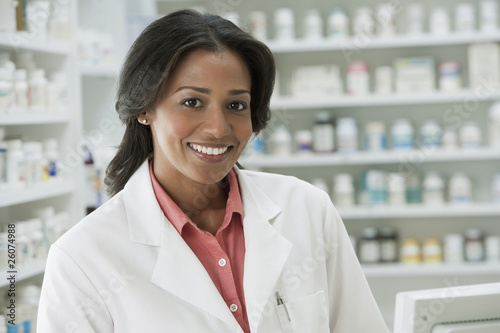 Photo: Smiling African pharmacist Smiling African pharmacist