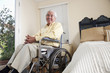Elderly Hispanic man in wheelchair