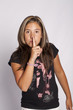 silence sign with the finger