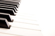 Close-up of a electronic piano keyboard on white
