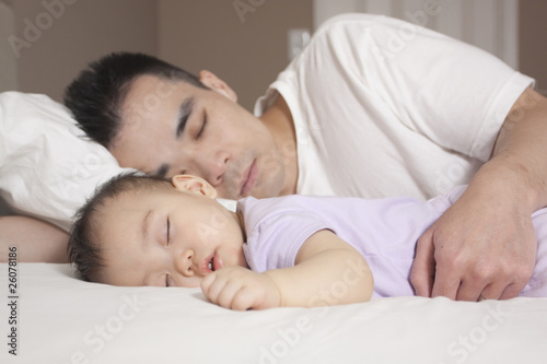 Photo: Chinese father and baby sleeping Chinese father and baby sleeping