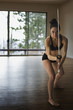 Mixed race woman performing martial arts with sword