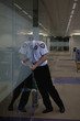 Hispanic security guard checking office