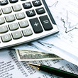 Financial concept. Calculator and pen.